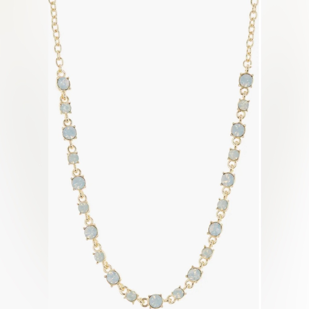 Gold-plated collar necklace, with opal colored stones.